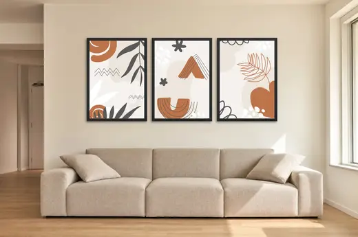 Pôster Trio boho de folhas e arcos em terracota emoldurado na parede: sala de estar ampla