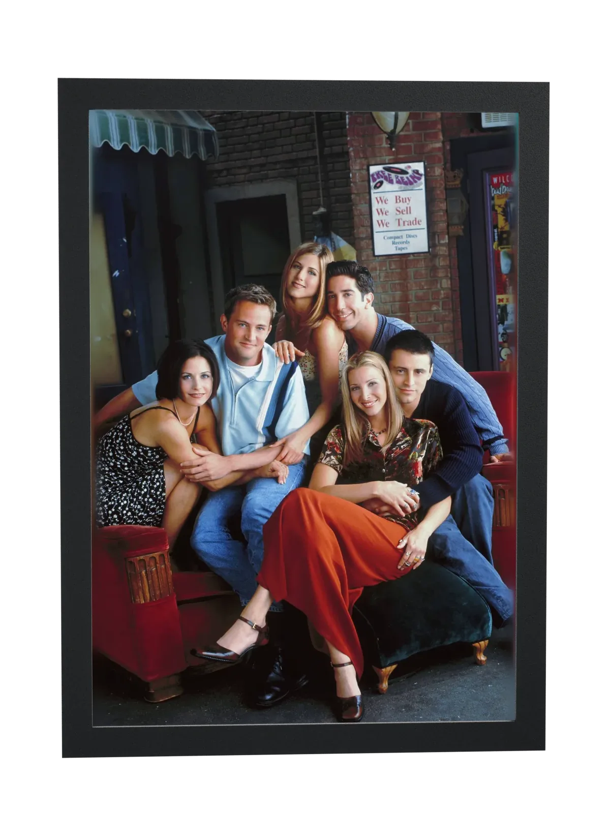 Pôster Friends (1994): grupo no sofá vermelho emoldurado